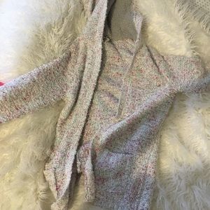 White and pink fuzzy sweater
